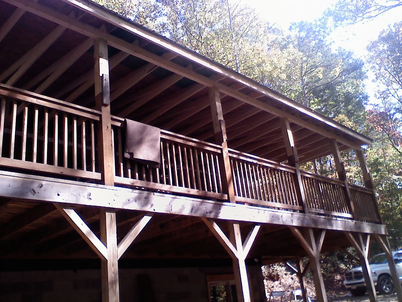 Timber framing under a new elevated porch and deck — Roof Leak Repair in Westmoreland City by Roofing Brothers